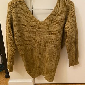 Light brown sweater with a knot back